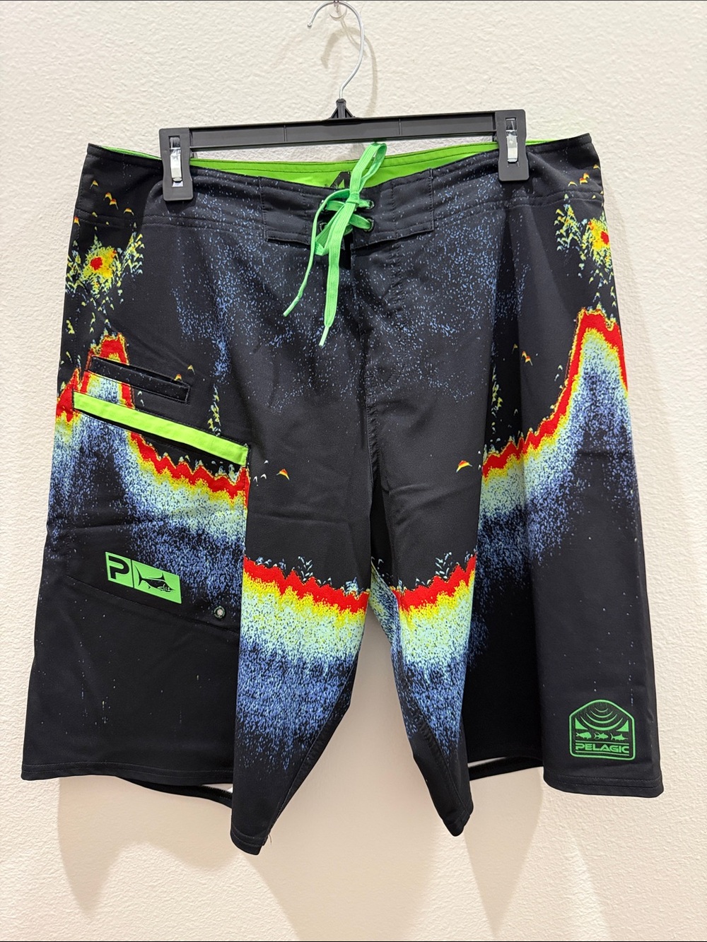 Pelagic Black Boardshorts with Neon Green and Multicolor Fishfinder Print